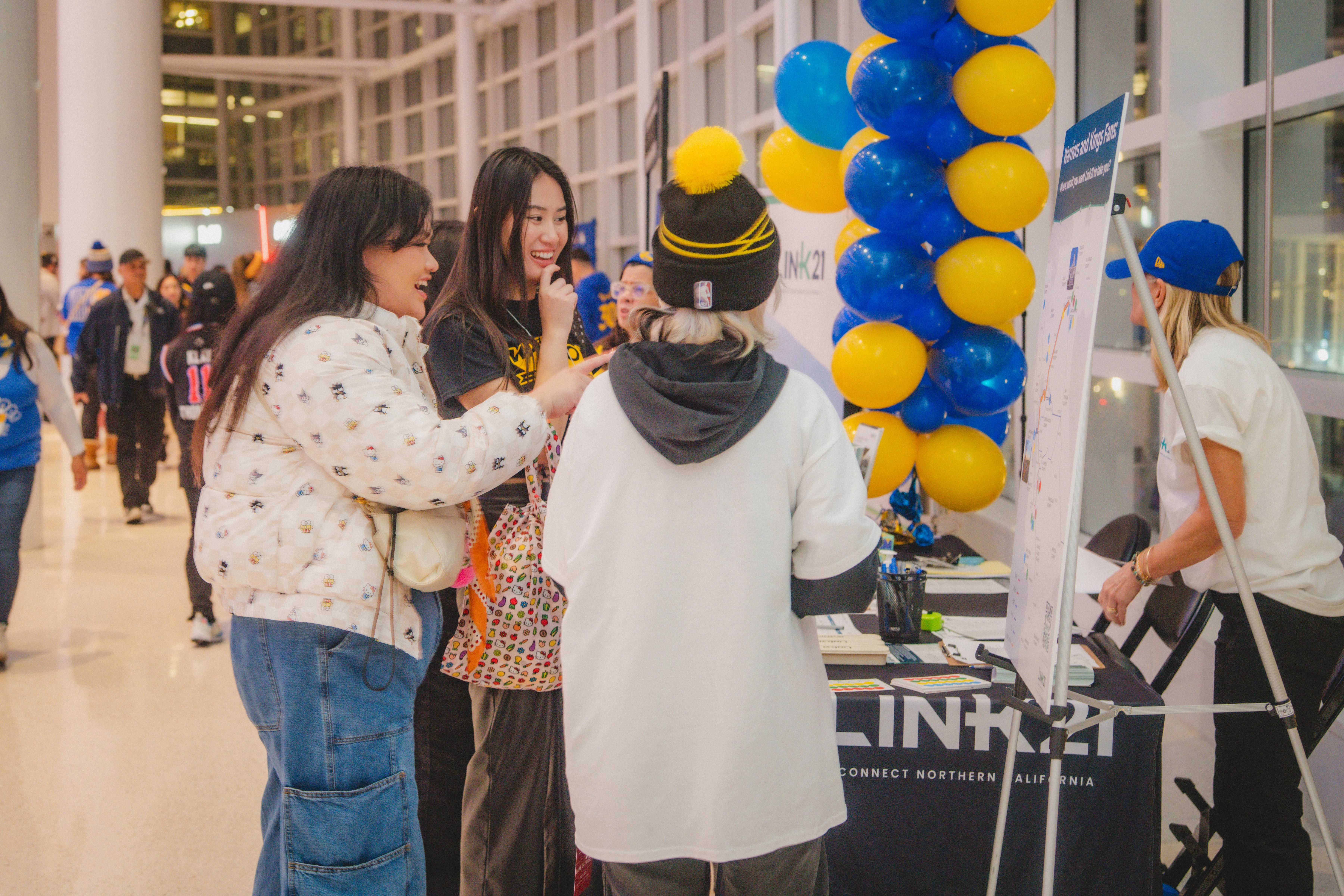 The Link21 Team engaging with fans at the Golden State Warrirors vs. Sacramento Kings game at Chase Center in San Francisco, January 2024 